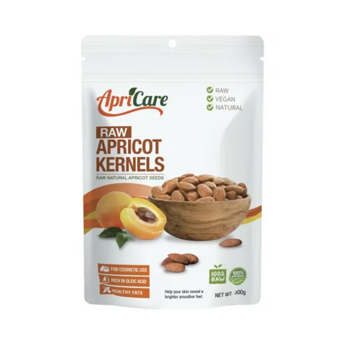 Apricare Raw Apricot Kernels 500g package featuring natural apricot seeds and fresh apricot fruit.
