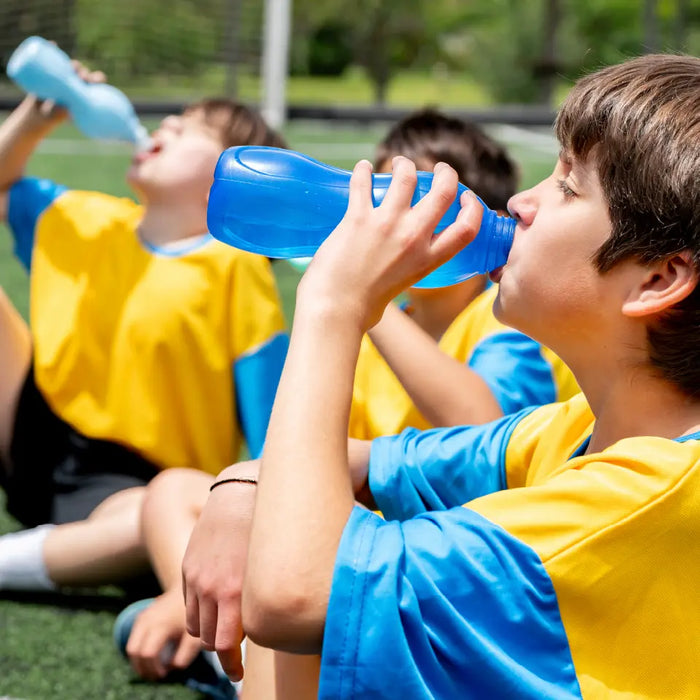 Mineralyte official Kids+ lifestyle image showing children drinking from sports bottles